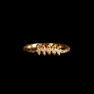 Tiny curved claw ring